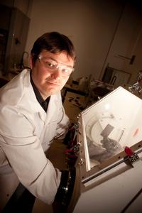 Aaron Marshall in his UC lab